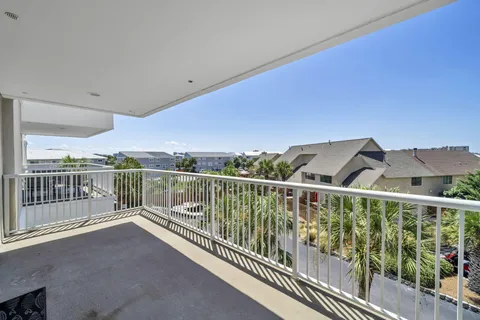 a view of balcony with furniture