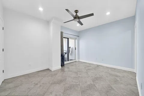 an empty room and window in a room