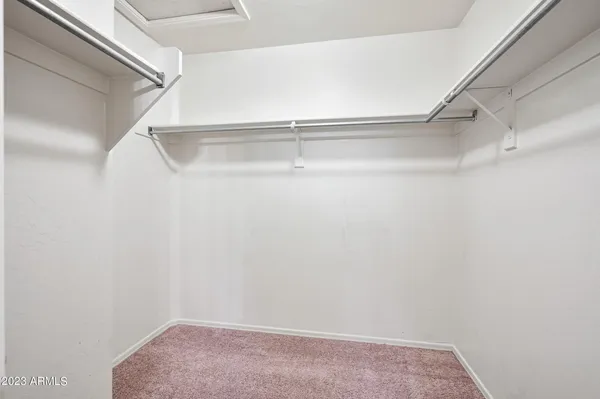 a view of an empty walk in closet