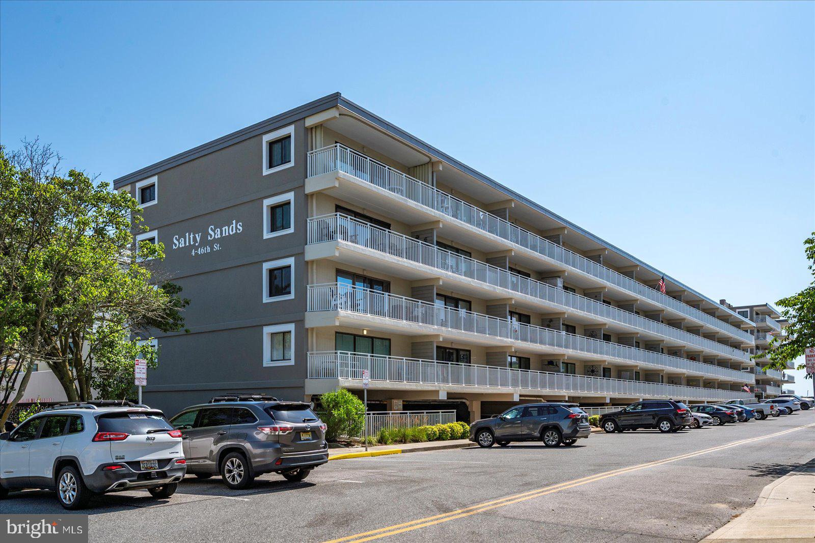 4 46th Street, Unit 101 Ocean City, MD 21842 - Photo 1 of 27 a front view of a building with street