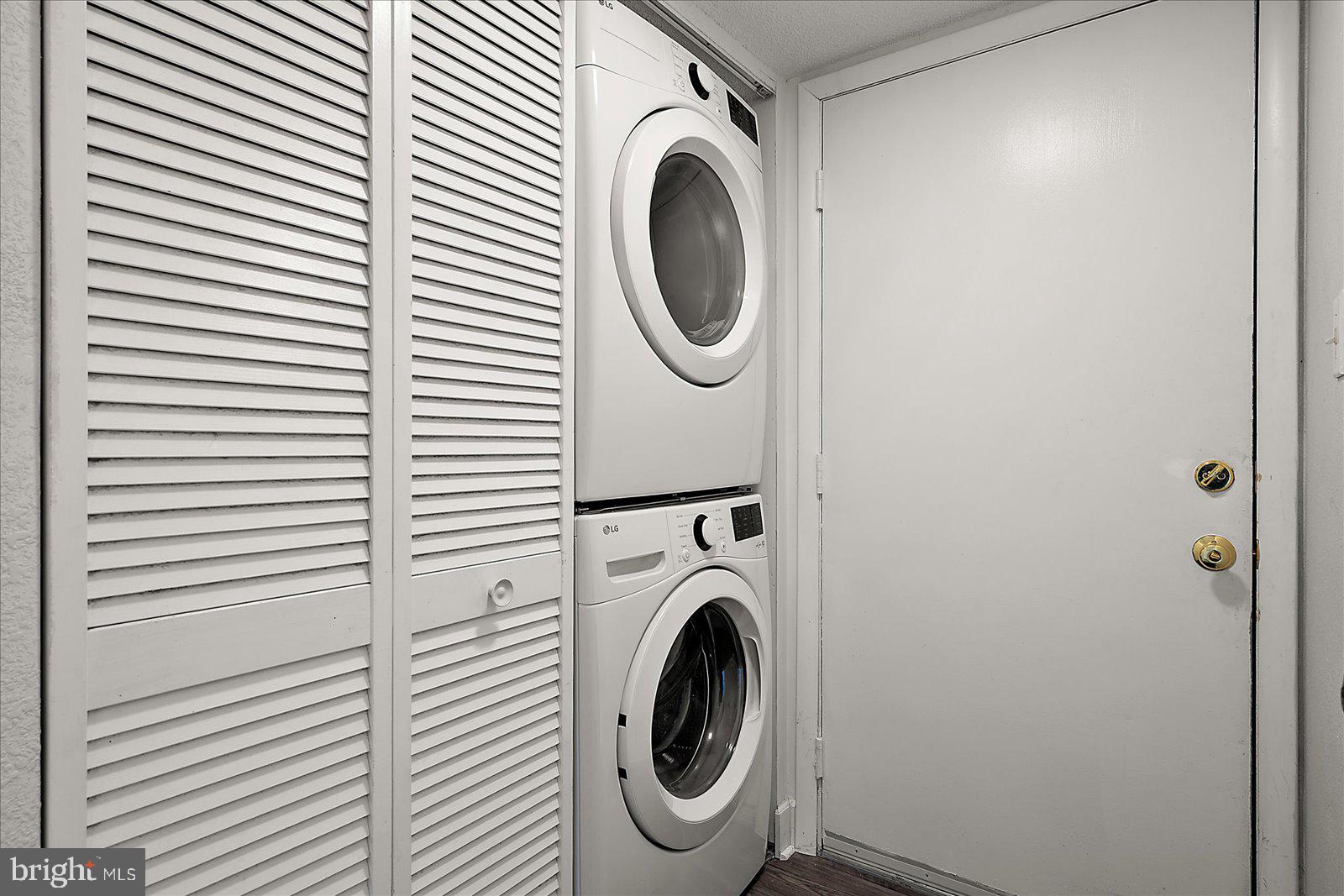 4 46th Street, Unit 101 Ocean City, MD 21842 - Photo 20 of 27 a utility room with dryer and washer