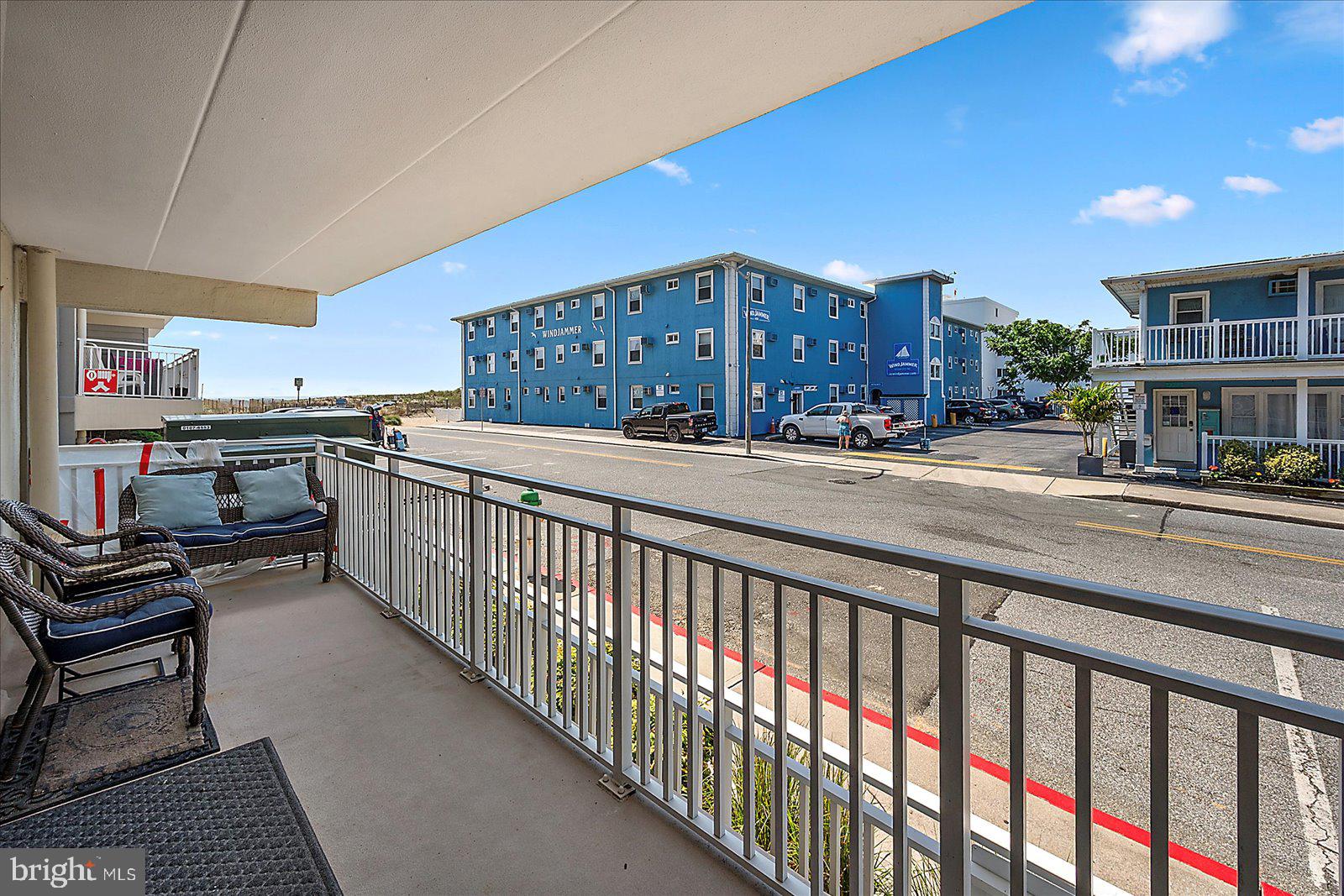 4 46th Street, Unit 101 Ocean City, MD 21842 - Photo 21 of 27 a view of a balcony and chairs