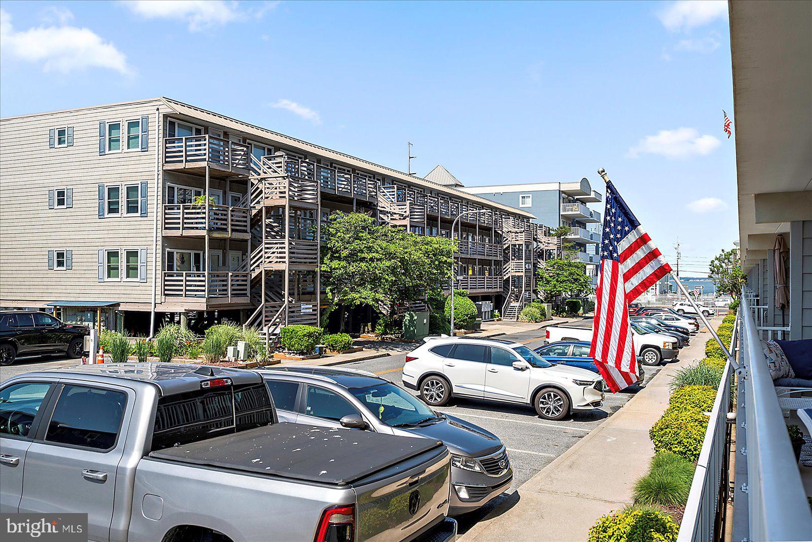 4 46th Street, Unit 101 Ocean City, MD 21842 - Photo 23 of 27 a car parked in front of a building