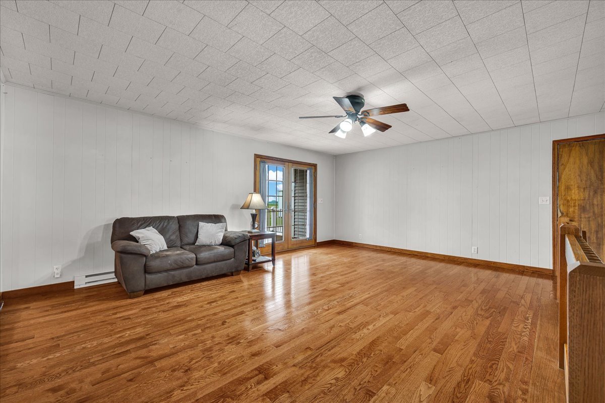 708 North 1950th Road Tonica, IL 61370 - Photo 15 of 95 a living room with furniture and a ceiling fan
