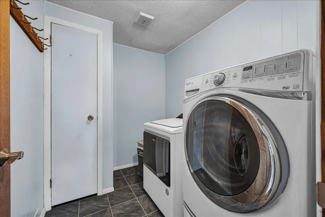 a view of a livingroom with furniture and wooden floor