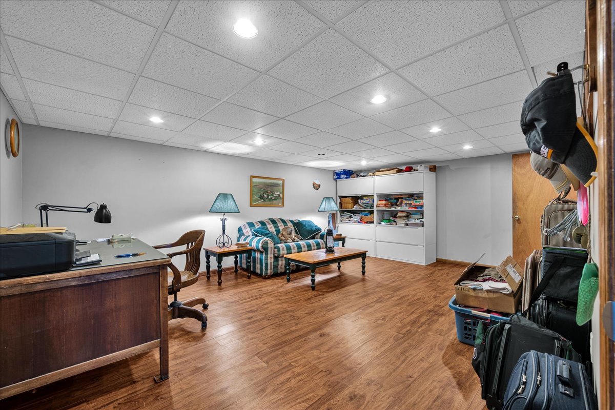 708 North 1950th Road Tonica, IL 61370 - Photo 27 of 95 a living room with furniture and a flat screen tv