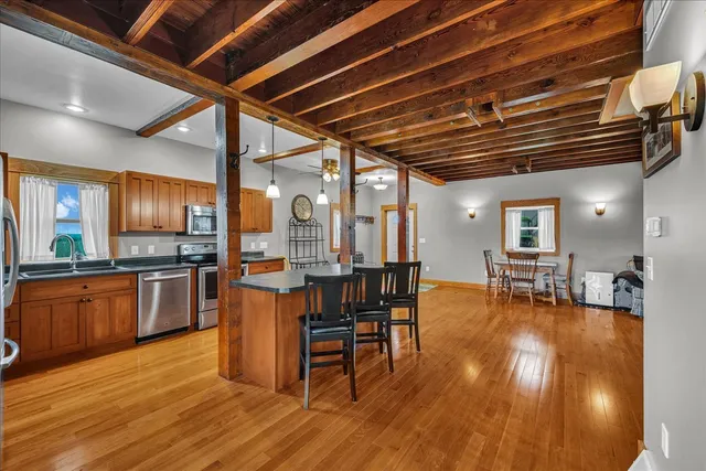 a view of a house with a big yard