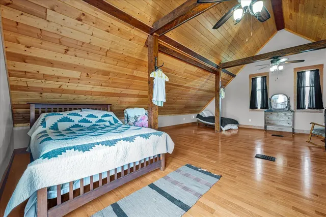 a view of a swimming pool with an outdoor seating