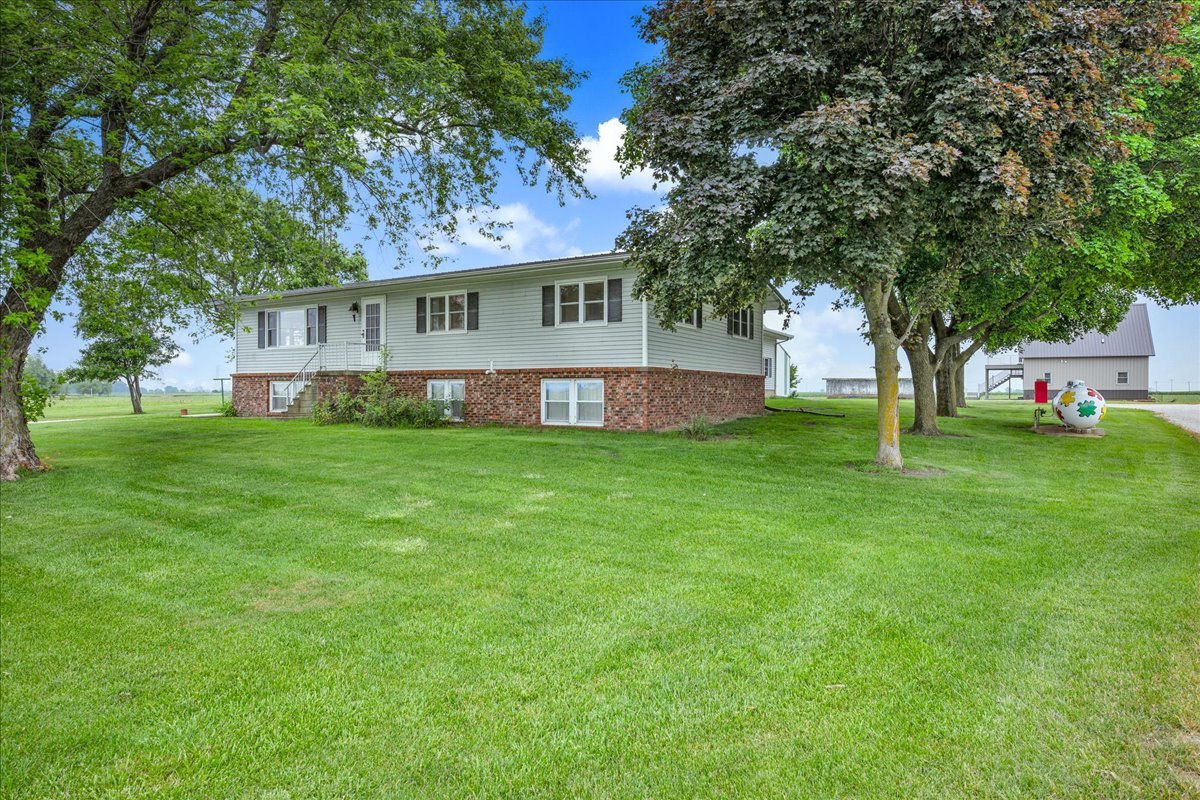 708 North 1950th Road Tonica, IL 61370 - Photo 54 of 95 a view of a house with a big yard and large trees