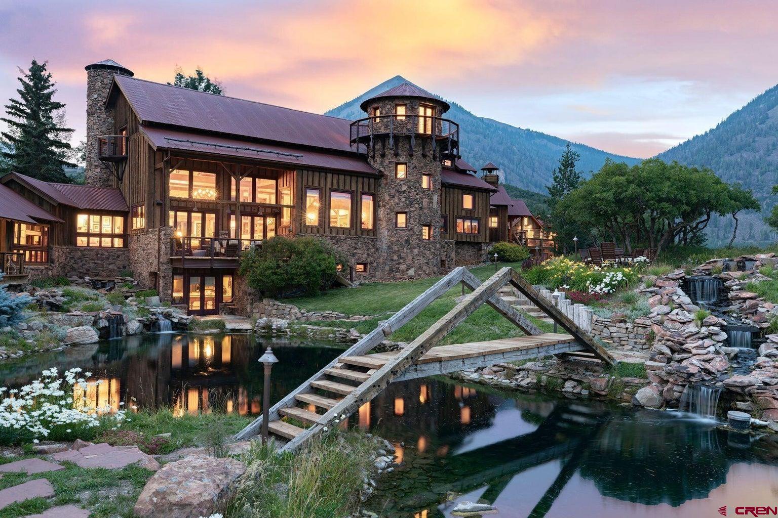 685 Wilson Way Telluride, CO 81435 - Photo 3 of 16 a front view of a house with garden