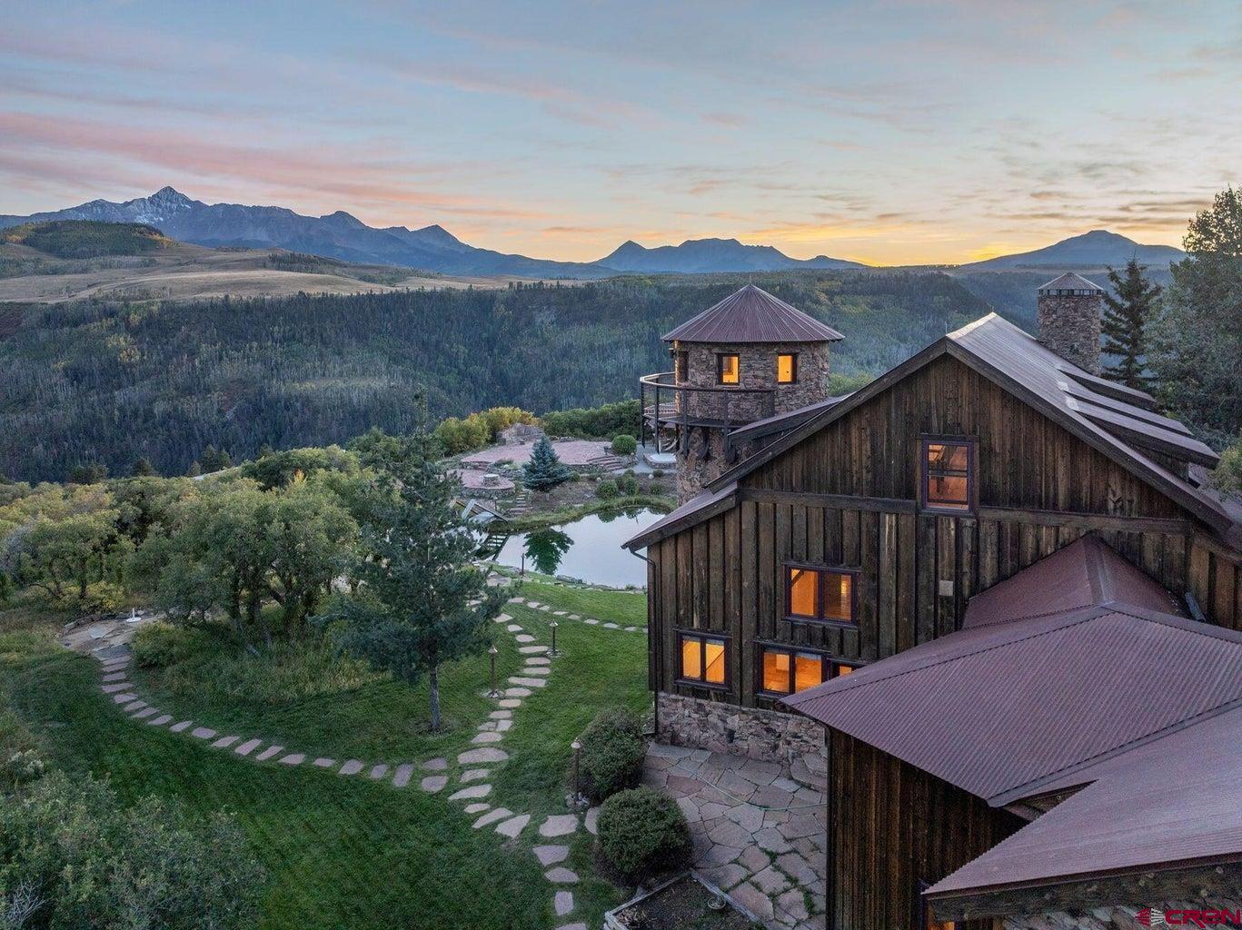 685 Wilson Way Telluride, CO 81435 - Photo 4 of 16 a view of a house with pool and a yard
