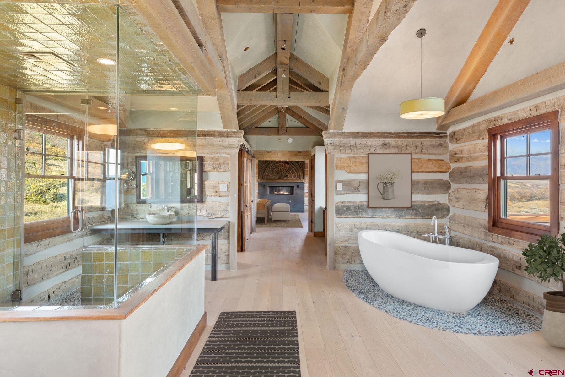 685 Wilson Way Telluride, CO 81435 - Photo 7 of 16 a large hall with wooden floor and chandelier