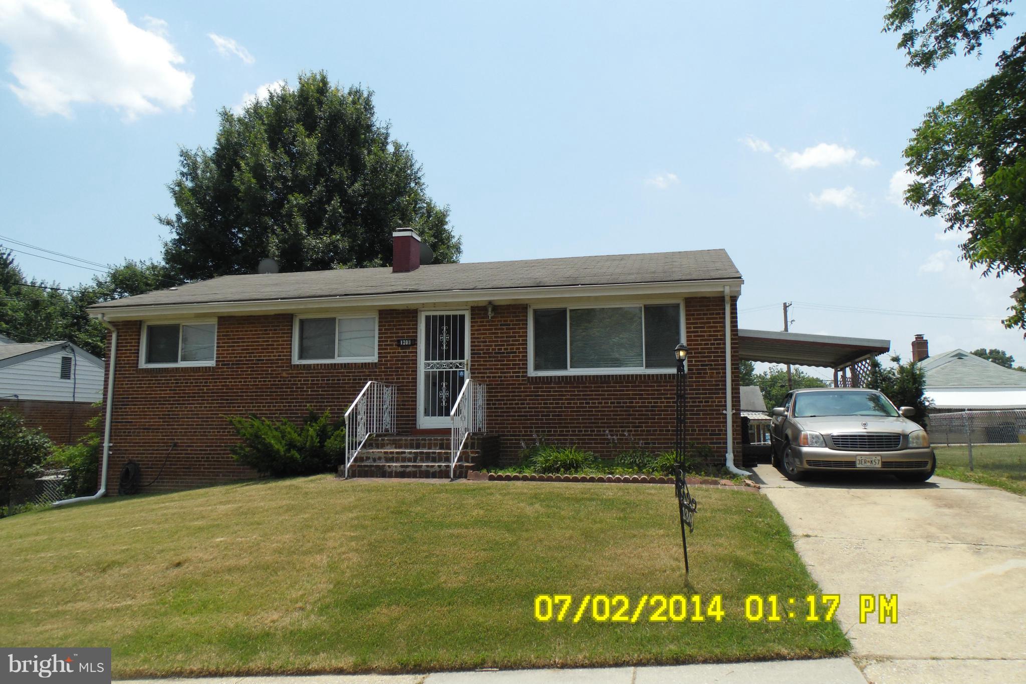 1303 Ray Road Hyattsville, MD 20782 - Photo 1 of 17 a view of a house with a patio