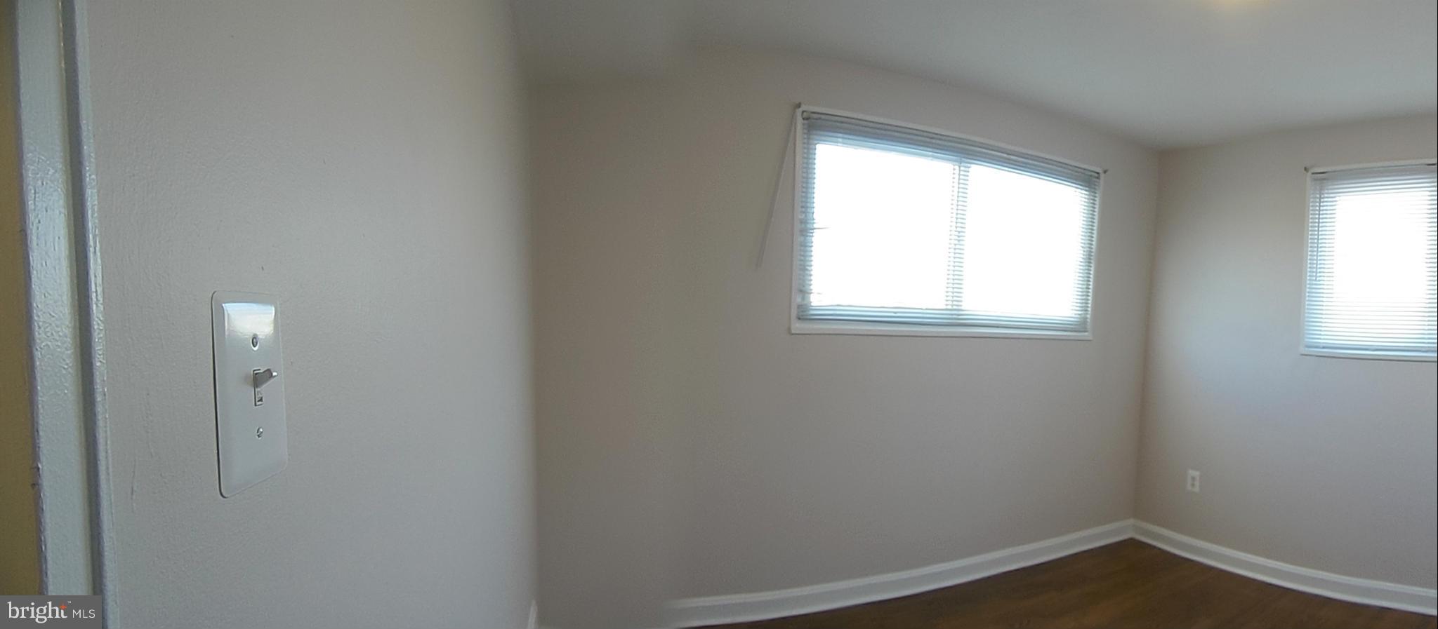 1303 Ray Road Hyattsville, MD 20782 - Photo 12 of 17 an empty room with a window