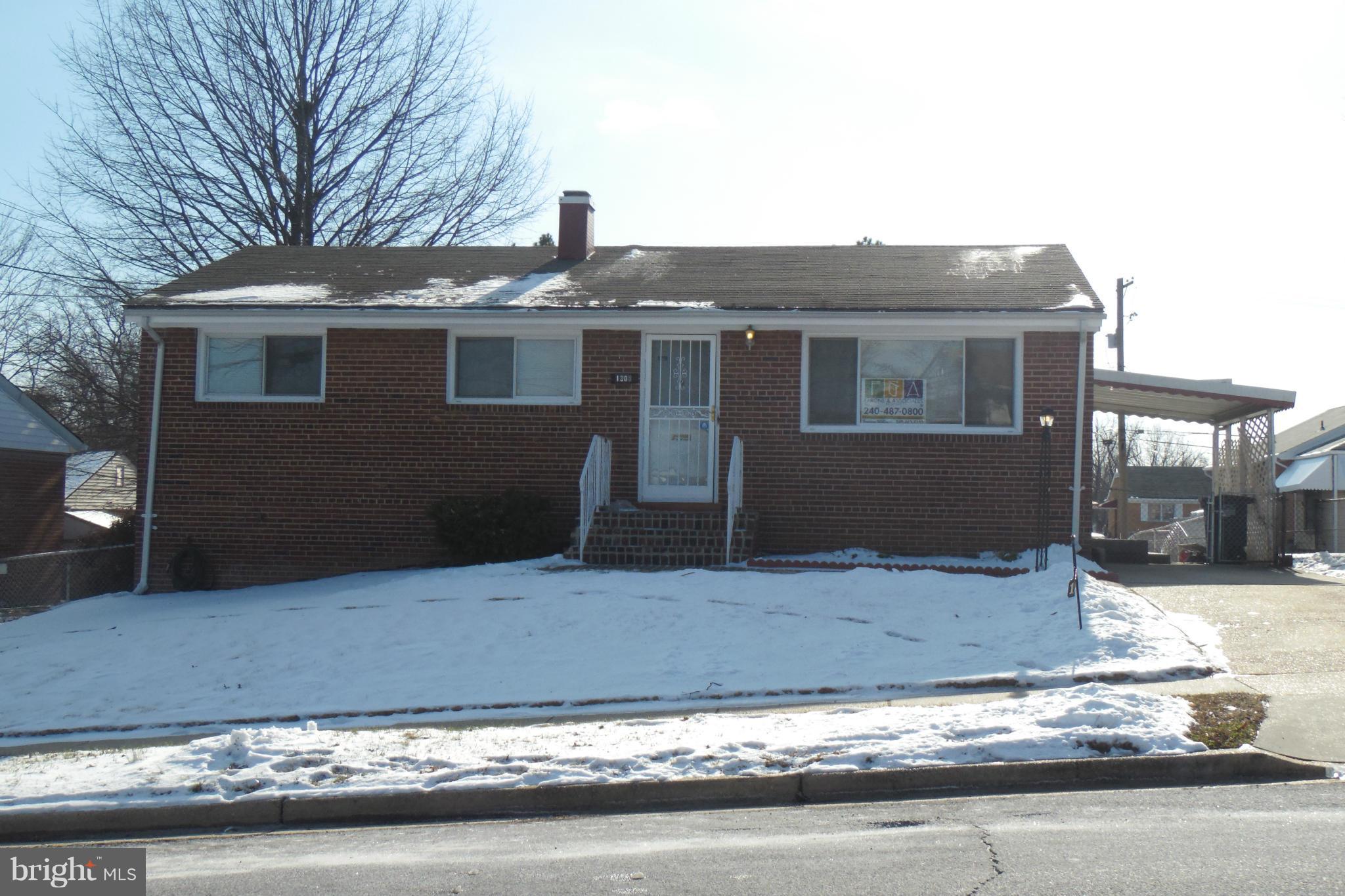 1303 Ray Road Hyattsville, MD 20782 - Photo 3 of 17 a front view of a house with yard