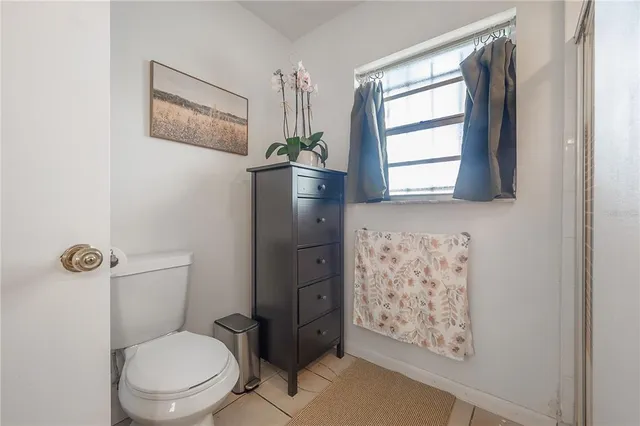 a bathroom with a tub and a shower