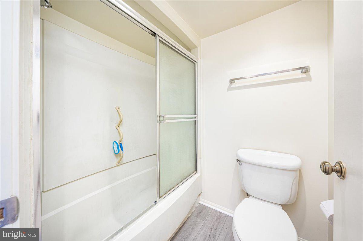 15101 Interlachen Drive, Unit 1807 Silver Spring, MD 20906 - Photo 34 of 50 a bathroom with a toilet and a shower