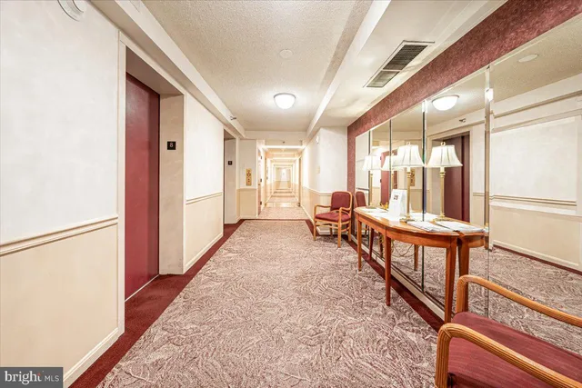 a view of hallway with stairs