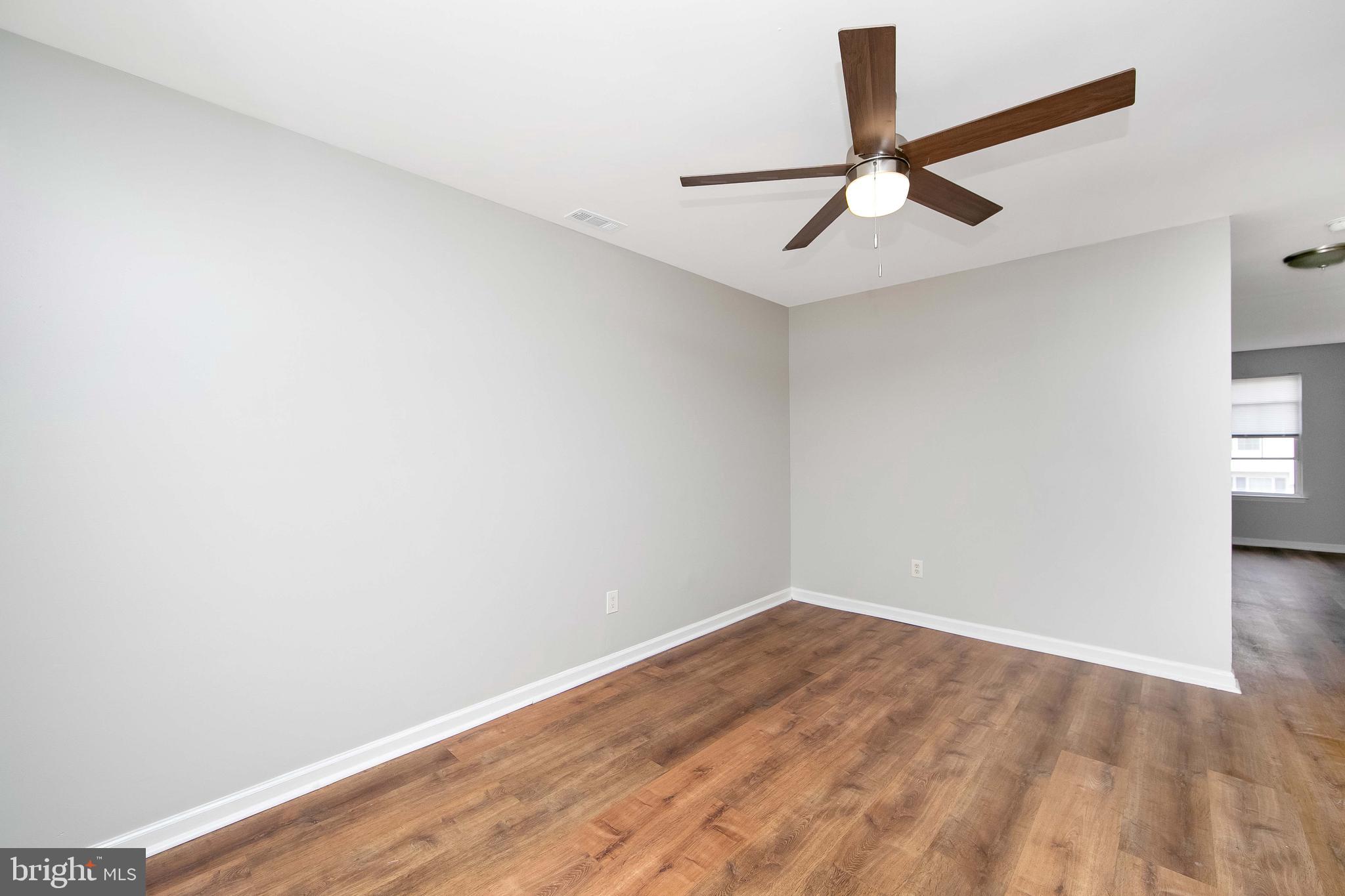 20 Gristmill Lane Pine Hill, NJ 08021 - Photo 12 of 37 wooden floor in an empty room