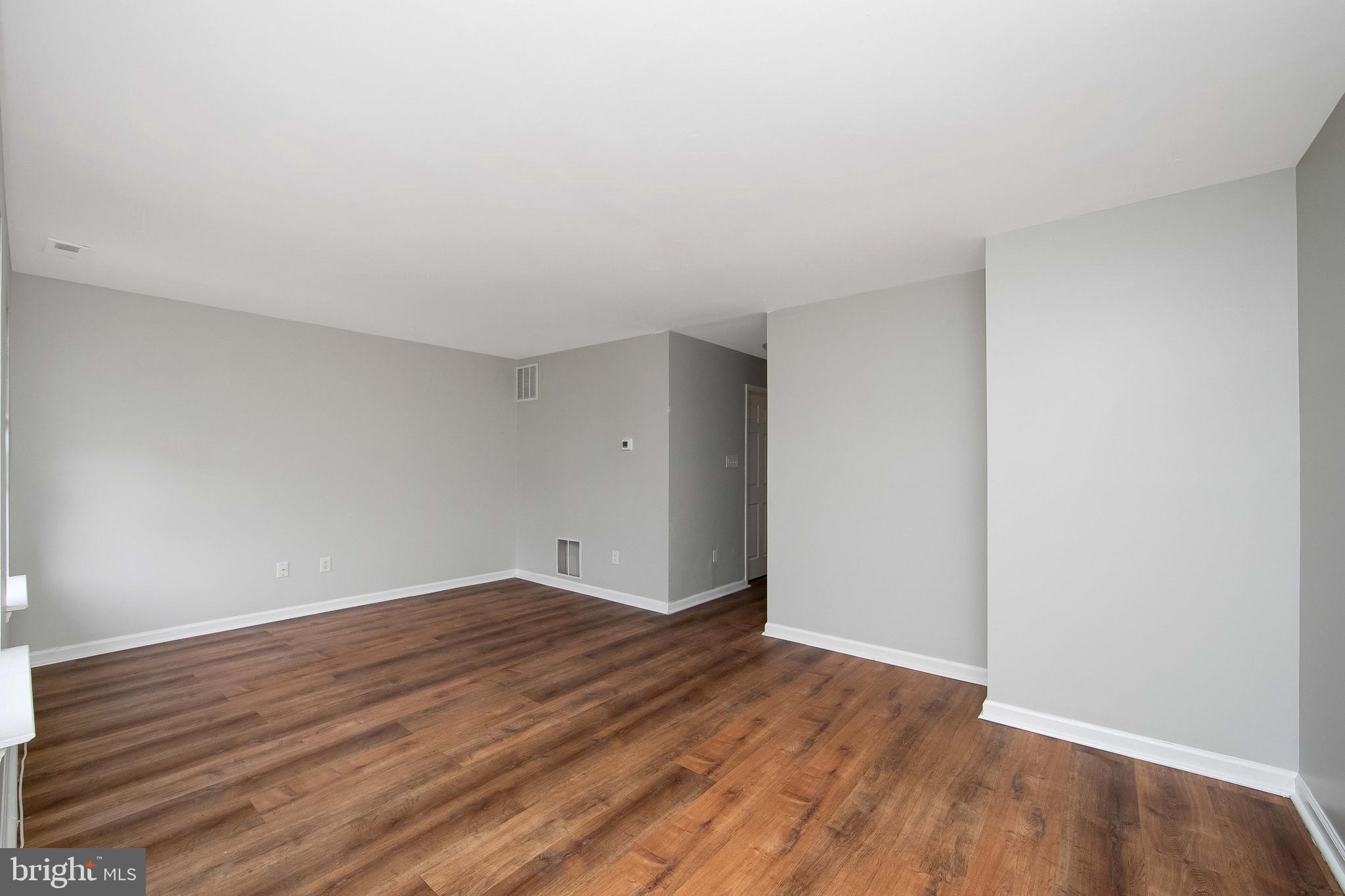 20 Gristmill Lane Pine Hill, NJ 08021 - Photo 14 of 37 a view of empty room with wooden floor