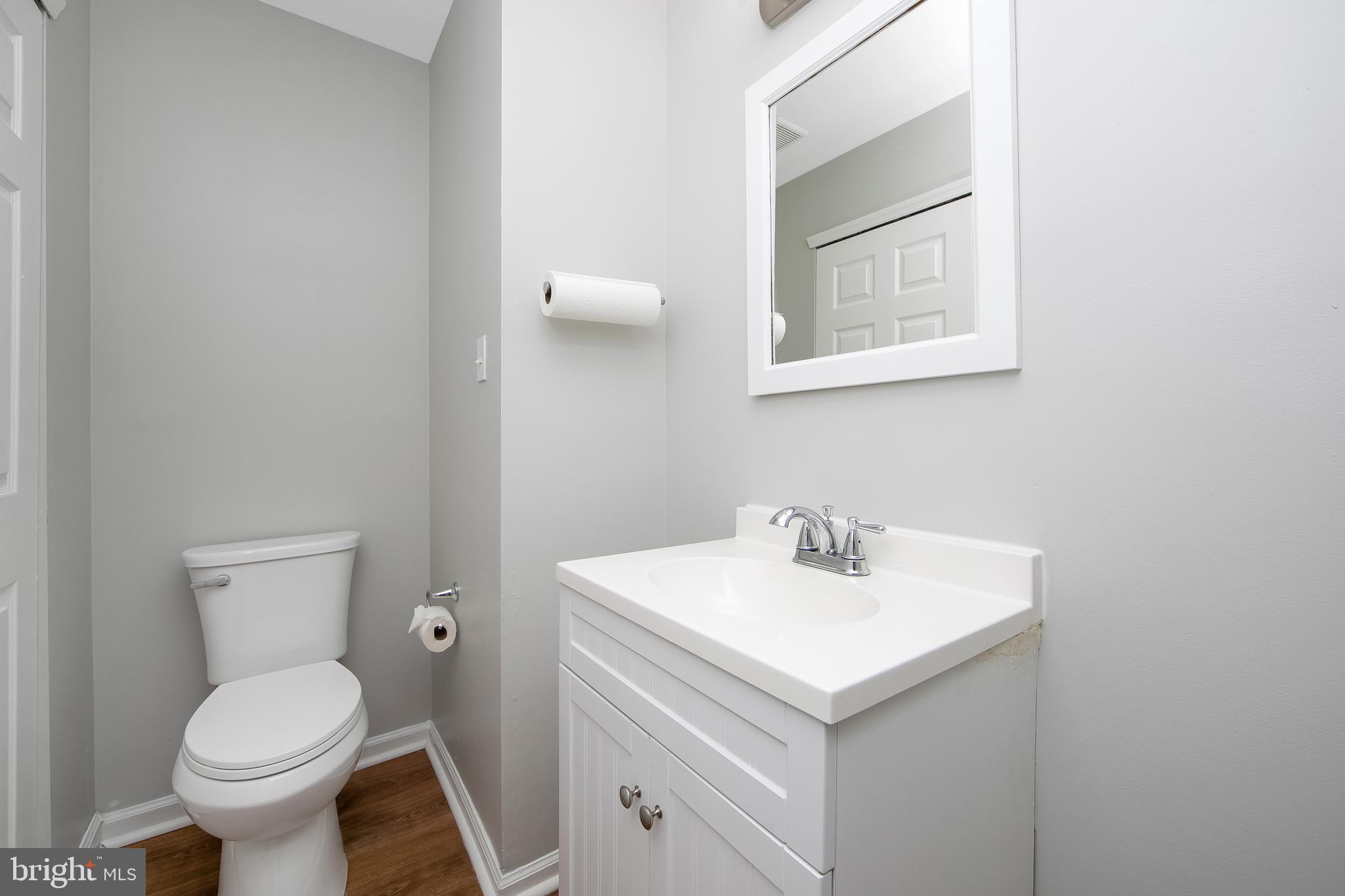 20 Gristmill Lane Pine Hill, NJ 08021 - Photo 17 of 37 a bathroom with a sink toilet and mirror