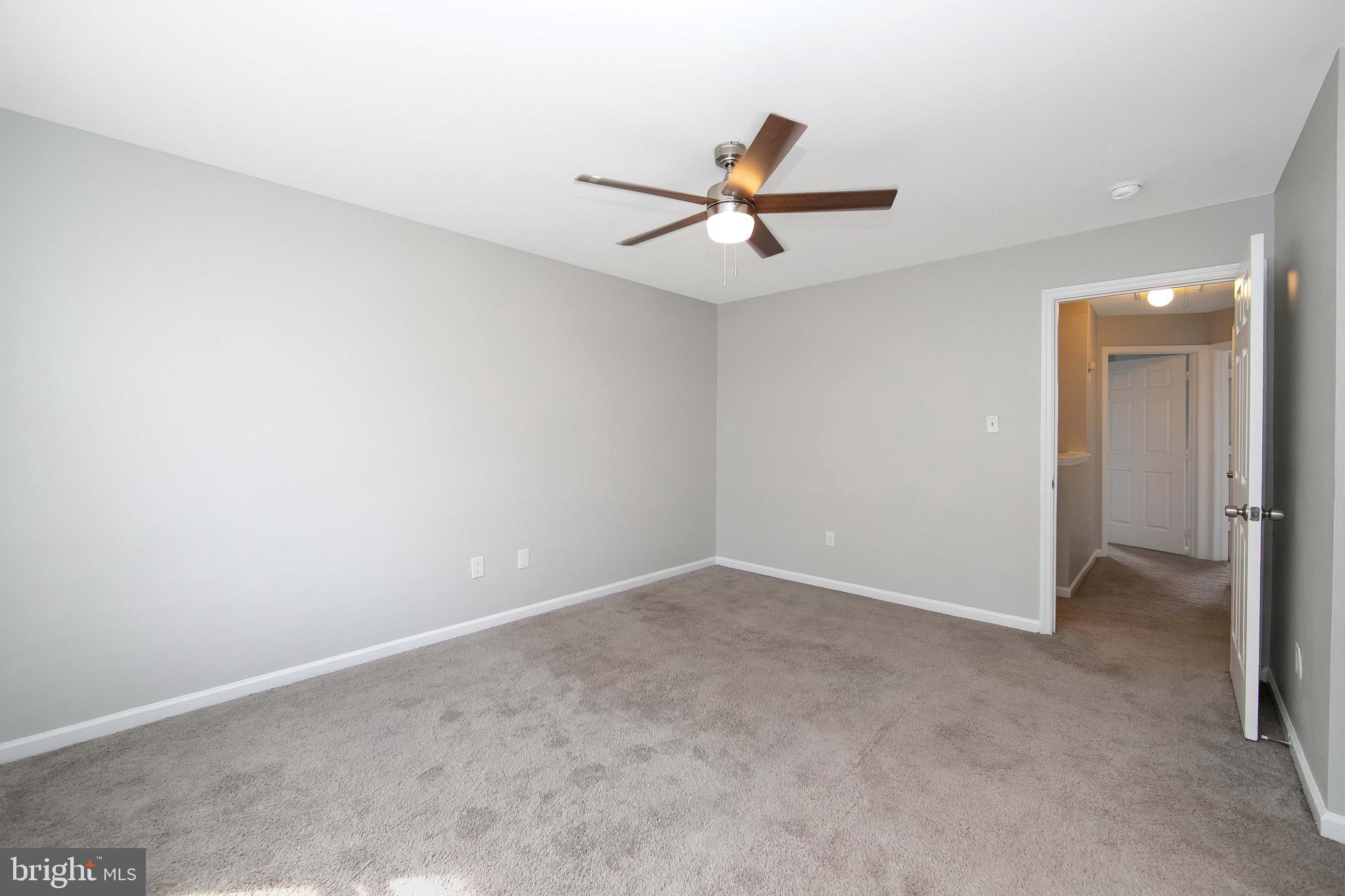 20 Gristmill Lane Pine Hill, NJ 08021 - Photo 21 of 37 an empty room with closet and windows