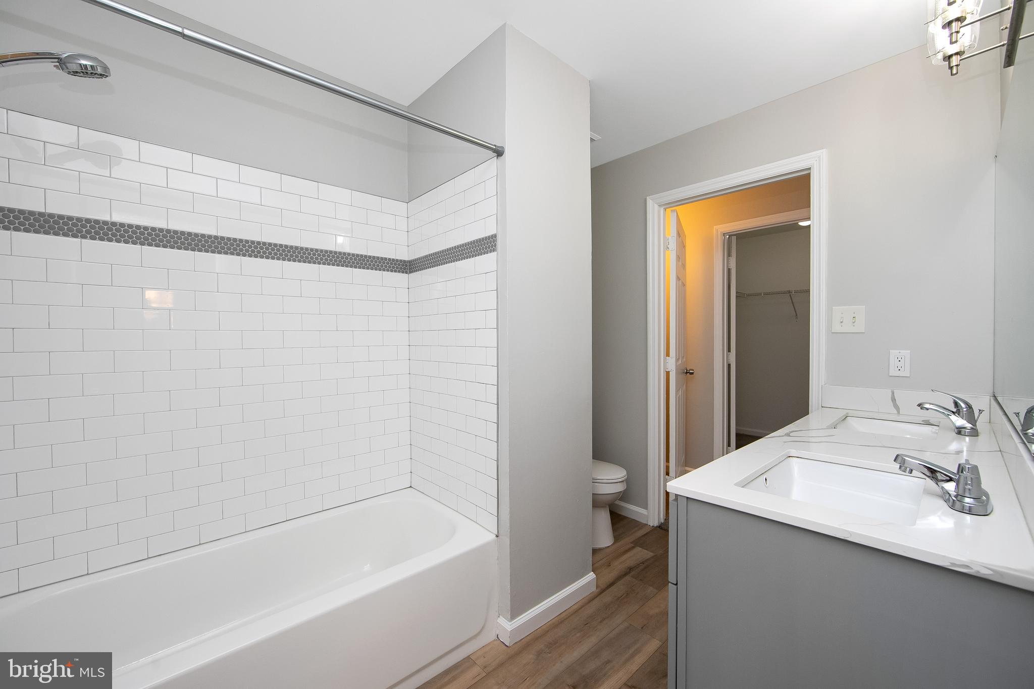 20 Gristmill Lane Pine Hill, NJ 08021 - Photo 24 of 37 a bathroom with a bathtub and a sink