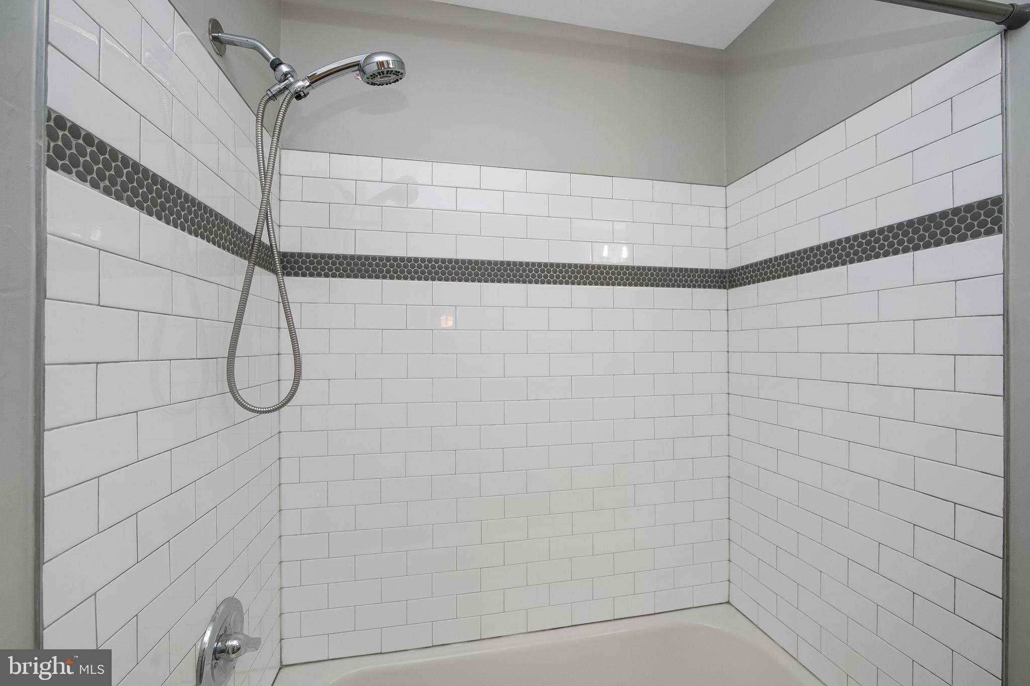 20 Gristmill Lane Pine Hill, NJ 08021 - Photo 25 of 37 a bathroom with a shower