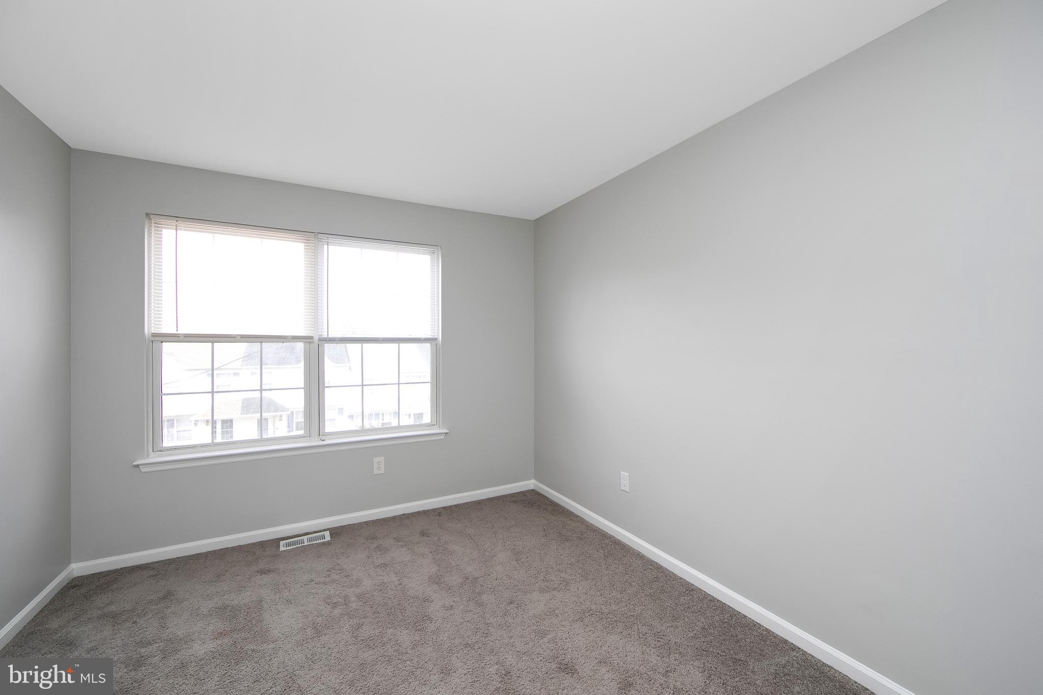 20 Gristmill Lane Pine Hill, NJ 08021 - Photo 30 of 37 an empty room with a window