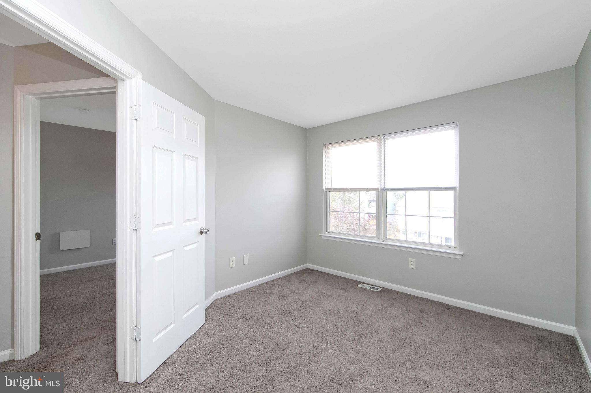 20 Gristmill Lane Pine Hill, NJ 08021 - Photo 32 of 37 an empty room with windows and closet