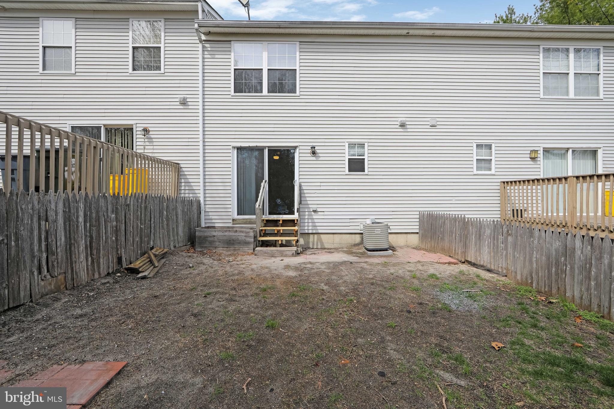 20 Gristmill Lane Pine Hill, NJ 08021 - Photo 37 of 37 a view of a house with backyard and furniture