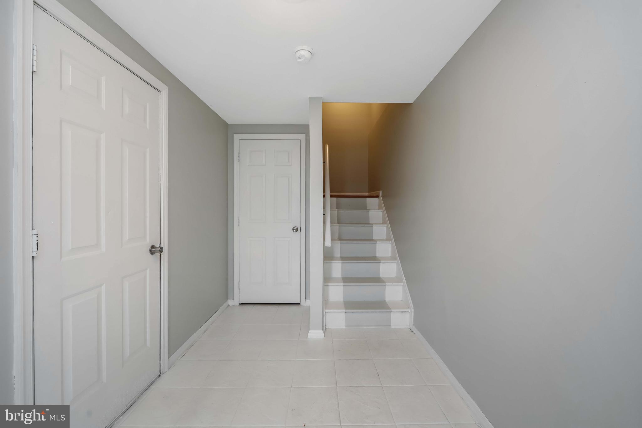 20 Gristmill Lane Pine Hill, NJ 08021 - Photo 4 of 37 a view of a hallway with stairs