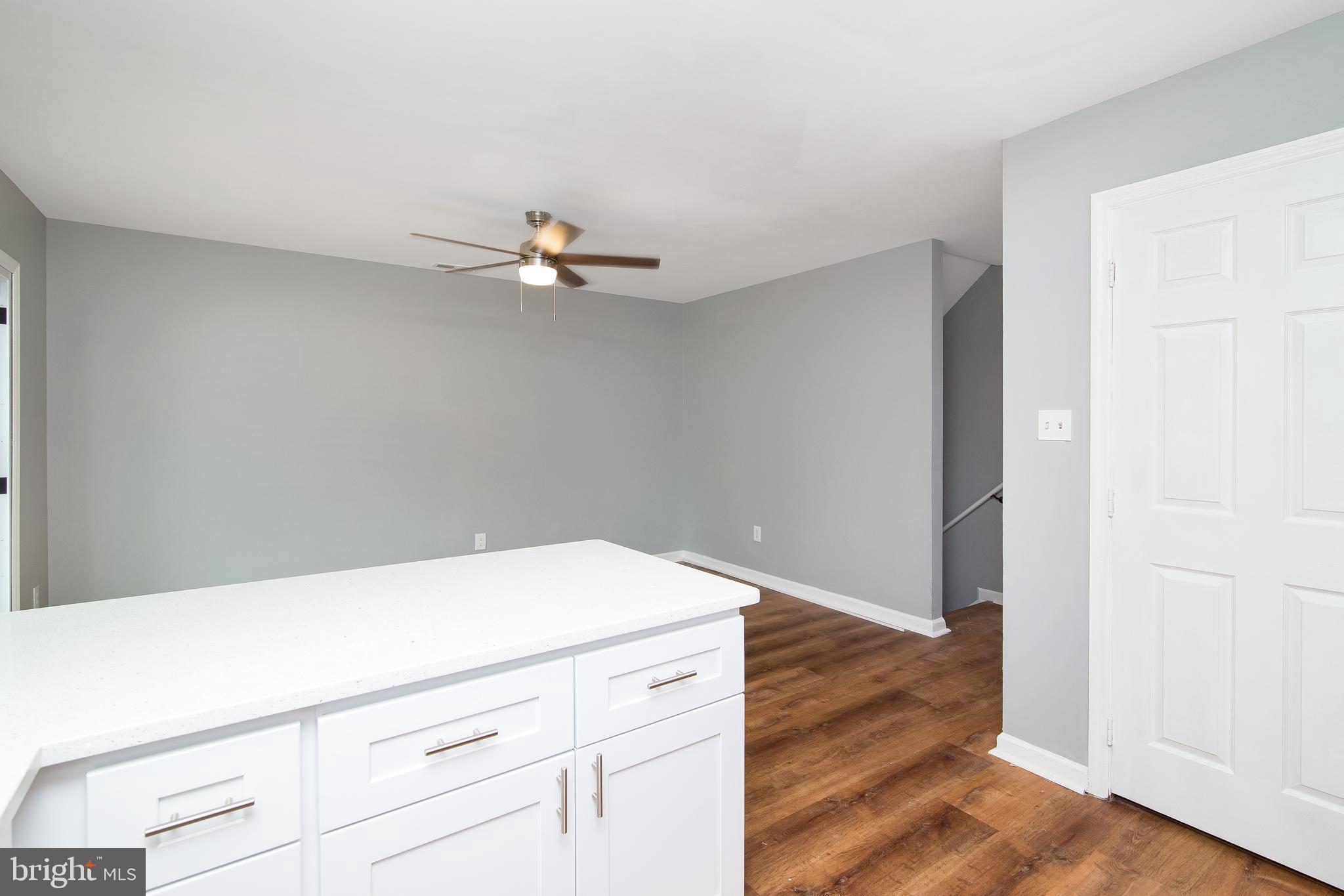 20 Gristmill Lane Pine Hill, NJ 08021 - Photo 10 of 37 a view of cabinets and wooden floor