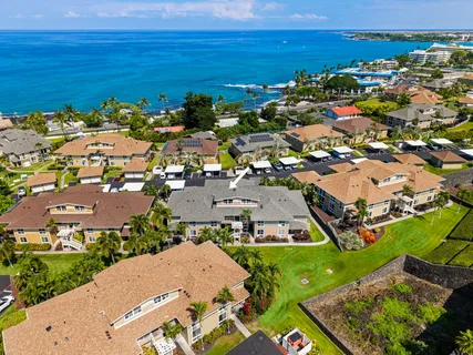 a view of a street with an ocean view