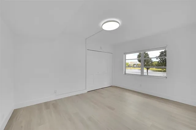 an empty room with window