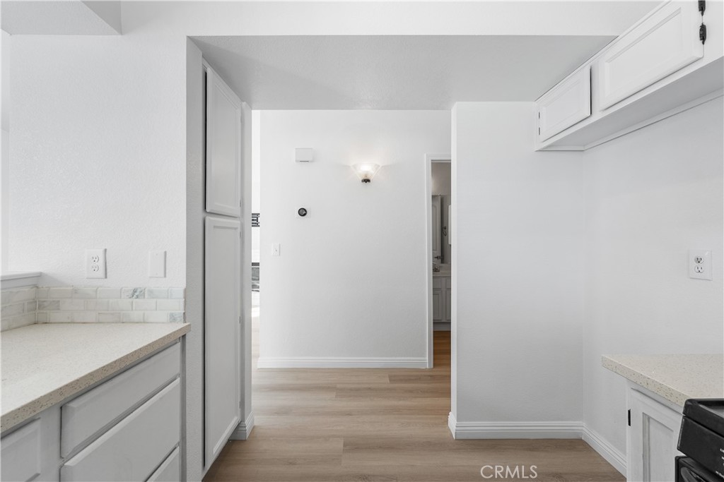 3209 Titcher Lane Rosamond, CA 93560 - Photo 18 of 36 a bathroom with a sink and a mirror