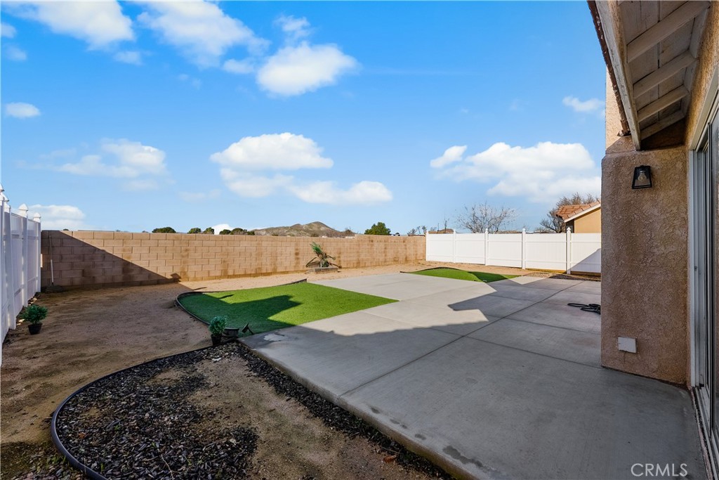 3209 Titcher Lane Rosamond, CA 93560 - Photo 30 of 36 a view of a backyard
