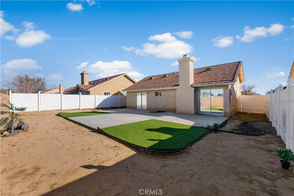 3209 Titcher Lane Rosamond, CA 93560 - Photo 31 of 36 a view of a backyard