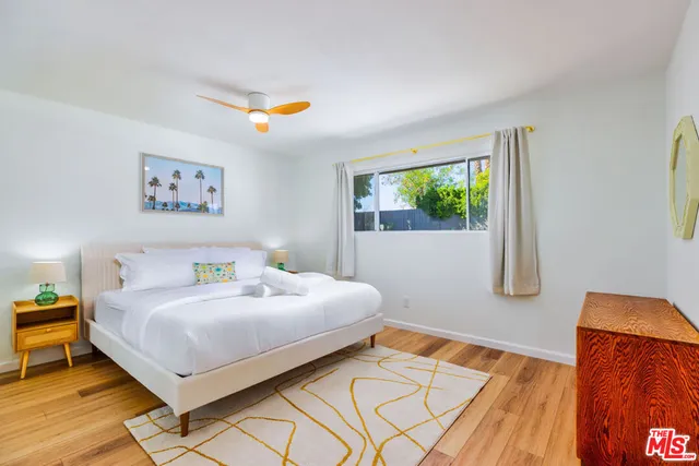 a view of an outdoor sitting area with furniture