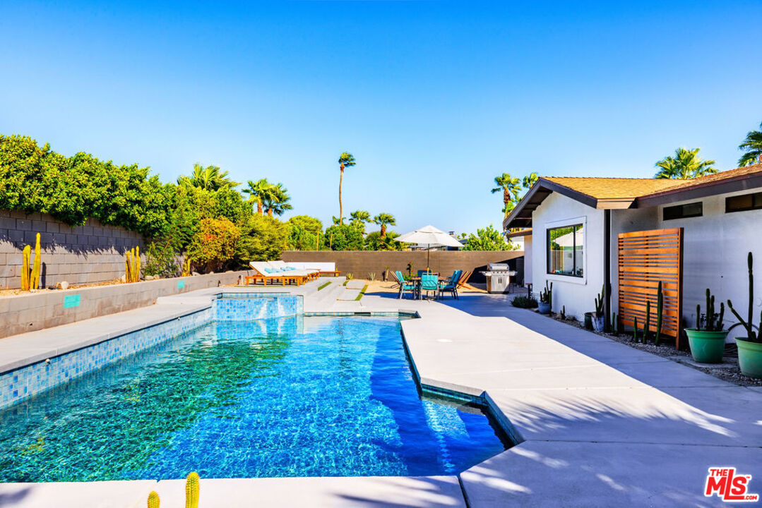 1250 East Delgado Road Palm Springs, CA 92262 - Photo 26 of 30 a view of a yard with furniture