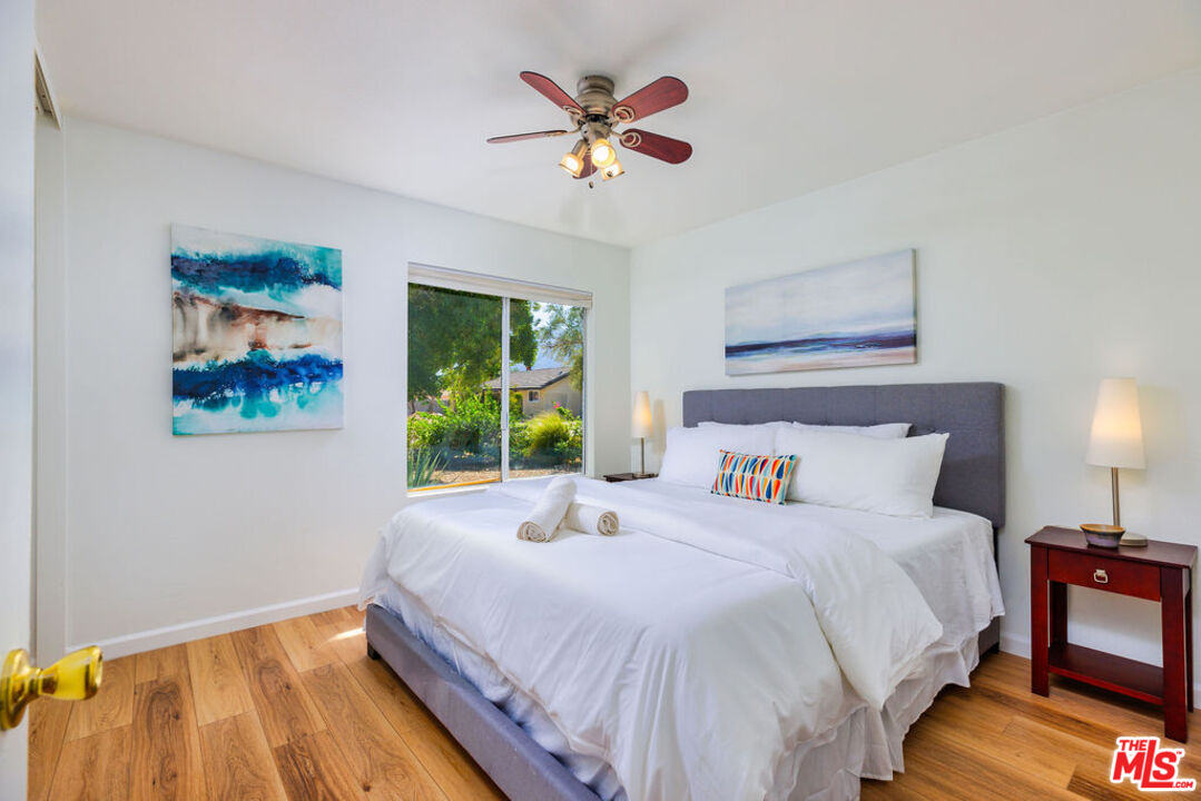 1250 East Delgado Road Palm Springs, CA 92262 - Photo 29 of 30 a bedroom with bed and a large window