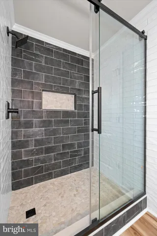 a view of a deck with wooden floor and wooden fence