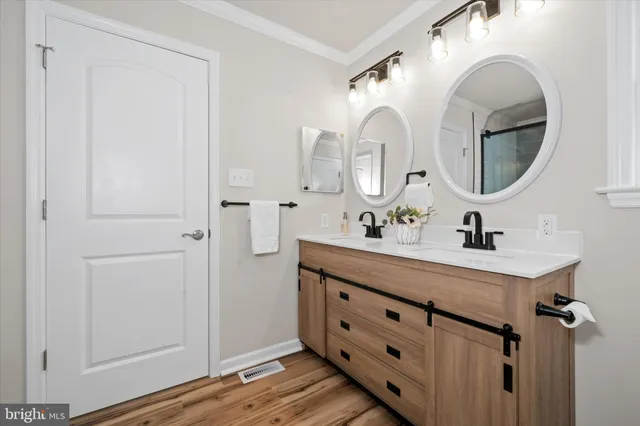 a view of a balcony with wooden floor