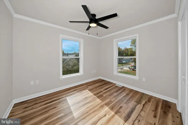 a bathroom with a bathtub a sink a toilet and a shower