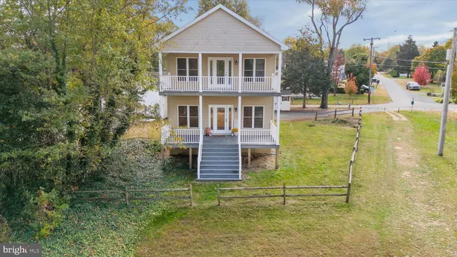 a view of a porch with wooden floor