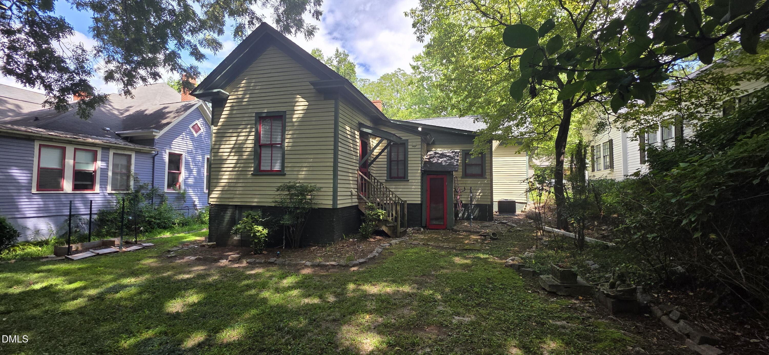 509 North East Street Raleigh, NC 27604 - Photo 3 of 18 a front view of a house with a yard