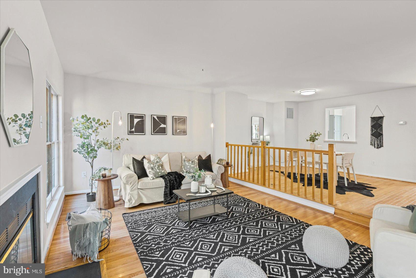9317 Dortmund Court Laurel, MD 20708 - Photo 21 of 50 a living room with furniture and wooden floor