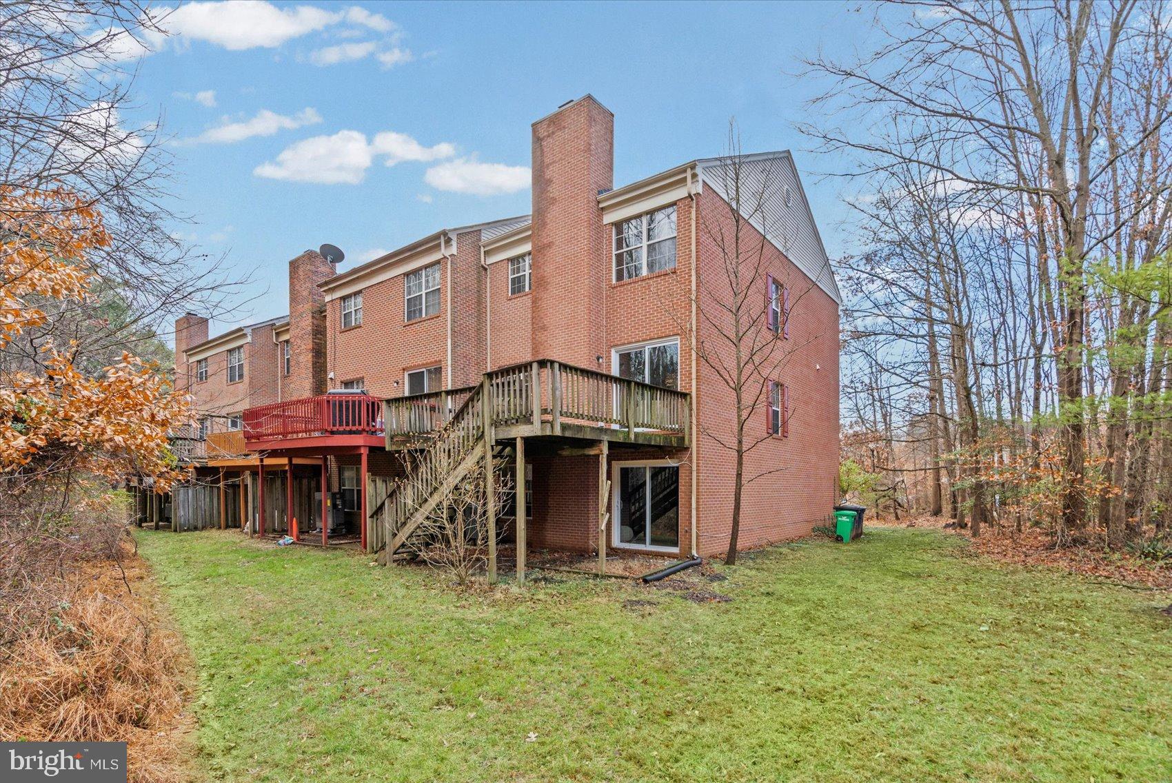9317 Dortmund Court Laurel, MD 20708 - Photo 44 of 50 a view of a house with a yard