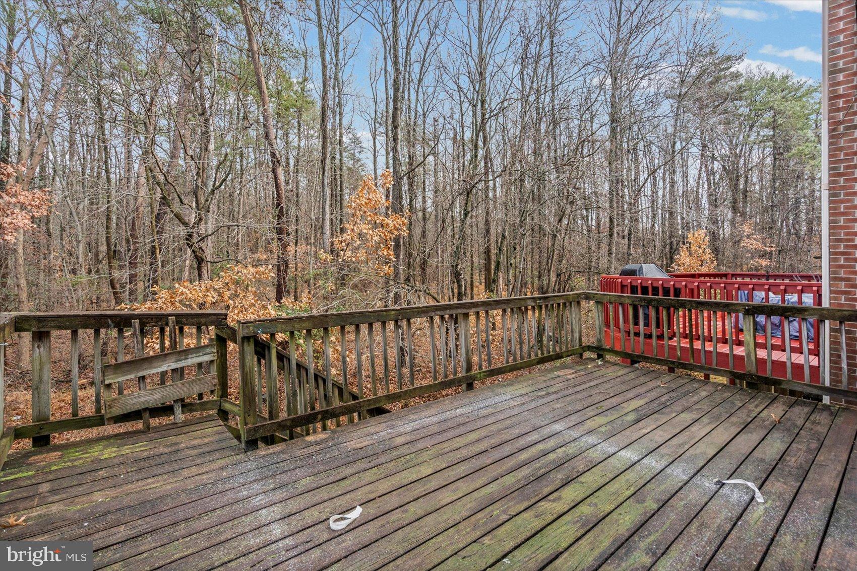 9317 Dortmund Court Laurel, MD 20708 - Photo 46 of 50 a view of deck with wooden floor and fence
