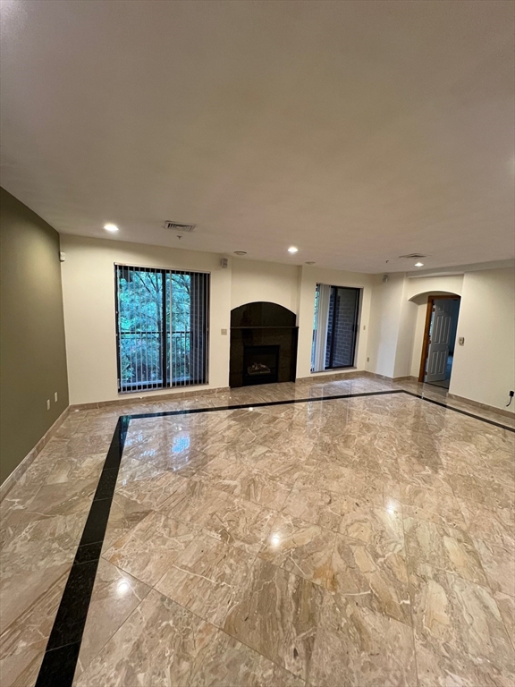 a view of an empty room and window